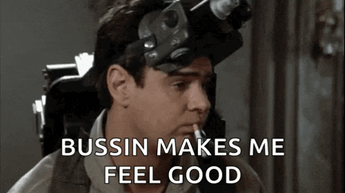 a man is wearing a helmet and smoking a cigarette and says `` bussin makes me feel good '' .