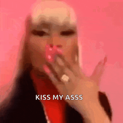 a woman is blowing a kiss with the words kiss my asss below her