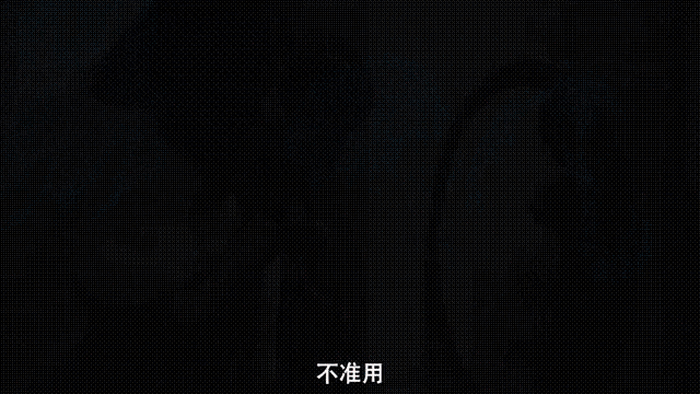 a woman is looking at her reflection in a mirror .