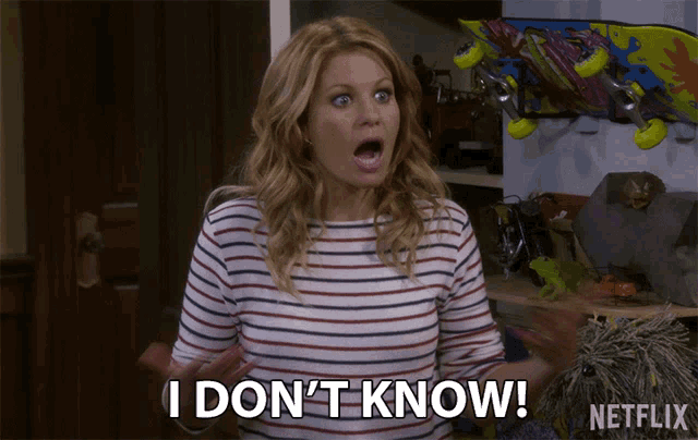 a woman says i don 't know in front of a skateboard