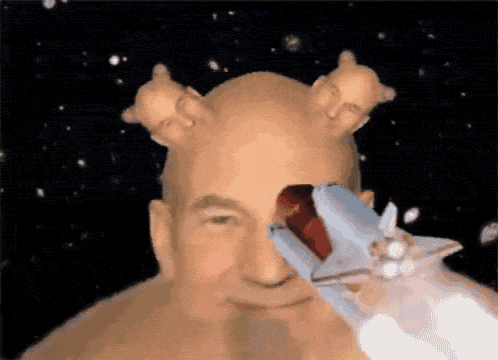a close up of a man 's face with a rocket in front of it