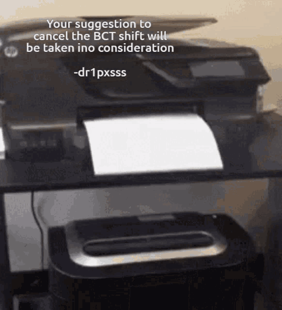 a printer is sitting on a desk with a suggestion to cancel the bct shift to be taken into consideration
