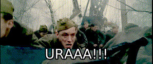 a man in a military uniform says uraaa !!! in front of a group of soldiers