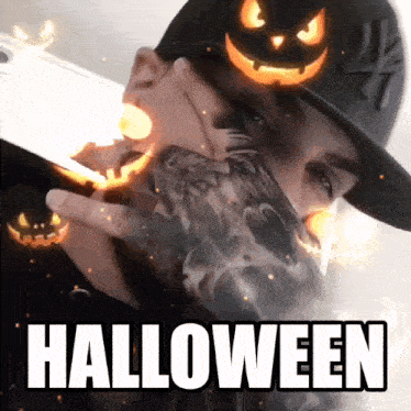 a man is wearing a hat with a pumpkin on it and the word halloween is on the bottom