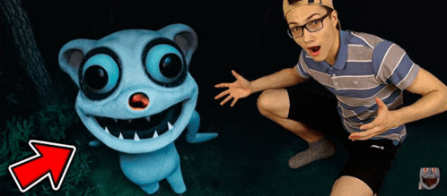 a man kneeling next to a cartoon character with an arrow pointing up