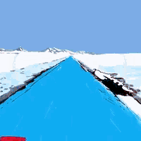 a red car is driving down a snowy road with mountains in the background