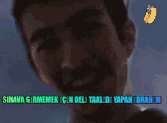 a close up of a man 's face with the words sınava girmemek cin del taklidi yapan ibrahim