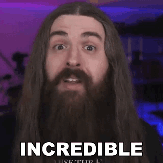 a man with long hair and a beard has the word incredible written on his face