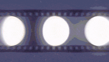 three white circles are on a blue background
