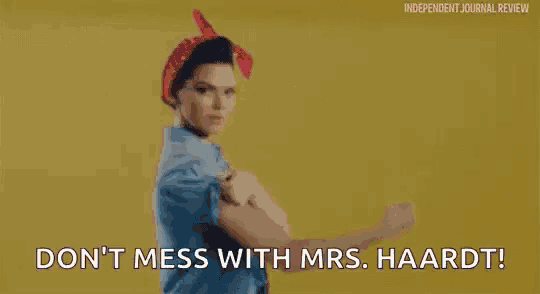 a woman is flexing her muscles and says `` don 't mess with mrs. haardt '' .