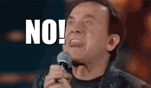 a man is singing into a microphone and says no .