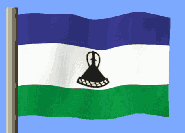 a blue white and green flag with a black symbol on the bottom