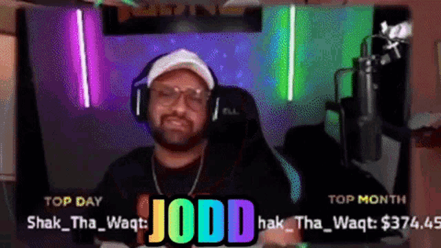 a man wearing headphones with the name jodd on the top