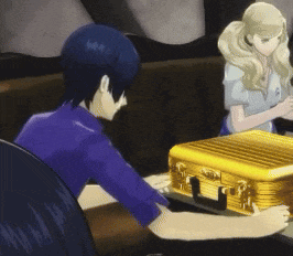 a man and a woman are sitting at a table with a yellow briefcase