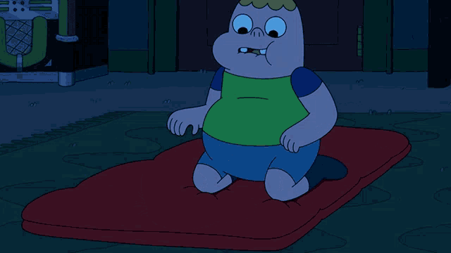 a cartoon character is sitting on a red mattress