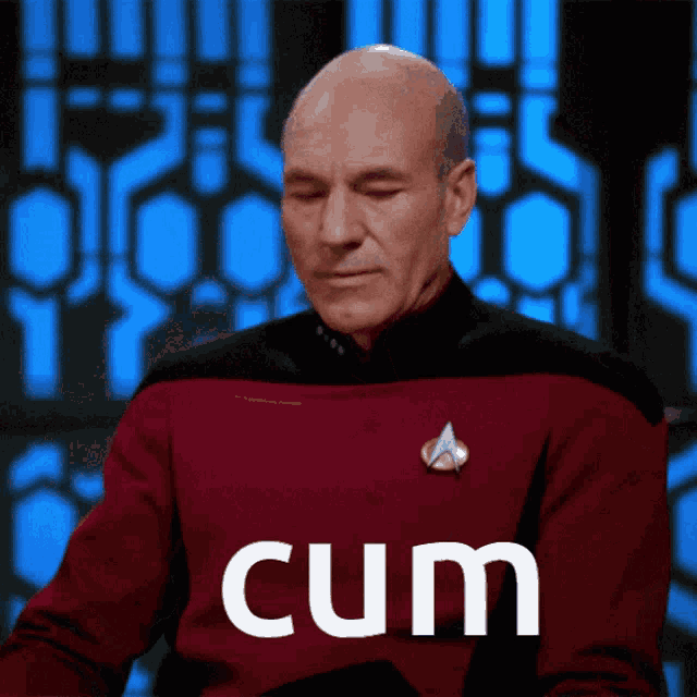 a man in a red shirt with the word cum written on it