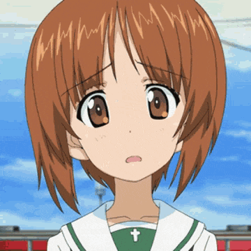 a close up of a cartoon girl with a cross on her shirt