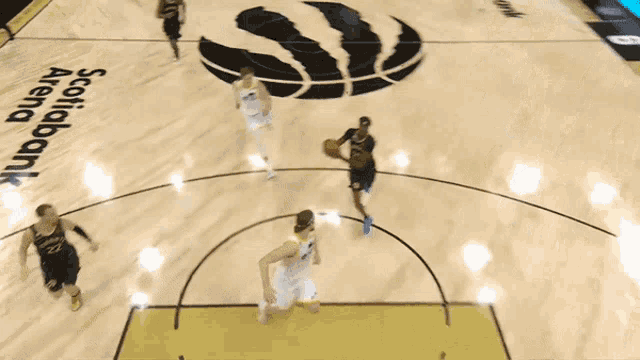 a basketball game is being played on a court with a logo for scotiabank arena