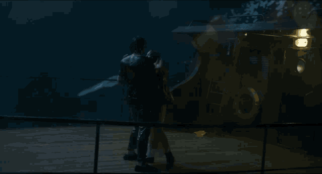a man is holding a woman in a white dress in the rain