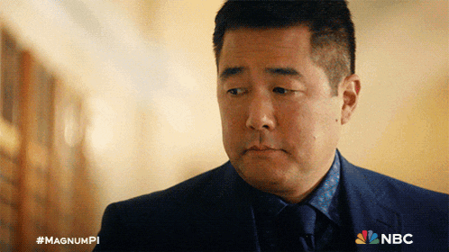 a man in a suit and tie with a nbc logo on the bottom