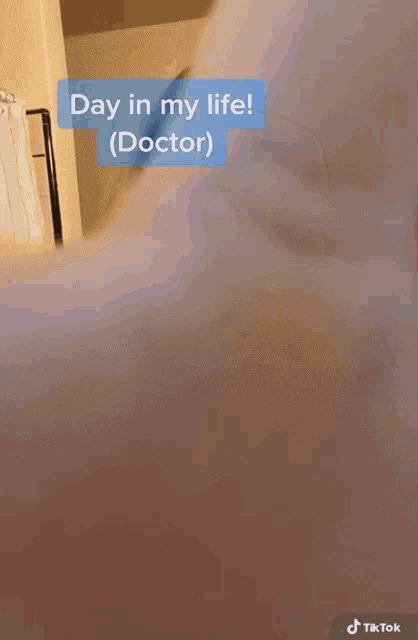 a blurred image with the words day in my life ( doctor ) on it