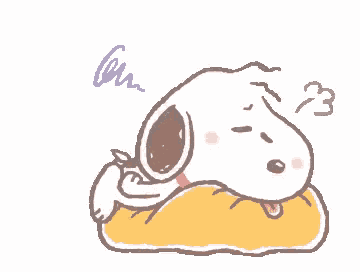 a cartoon of snoopy laying on a bed with a pillow .