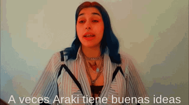 a woman with blue hair says " a veces araki tiene buena ideas "