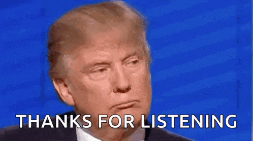 donald trump is holding his finger to his ear while saying thanks for listening .