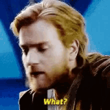 a man with a beard is talking to someone and says what ?