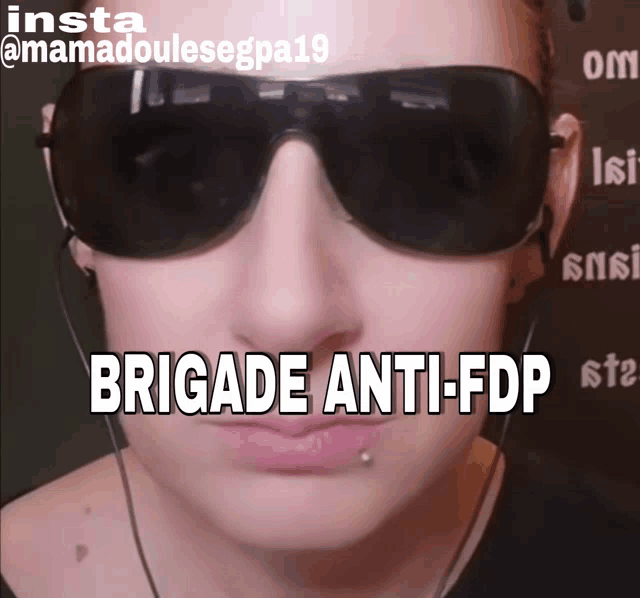 a woman wearing sunglasses says brigade anti-fdp on her face