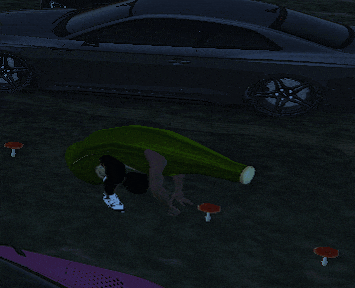 a person is laying on their back in front of a car