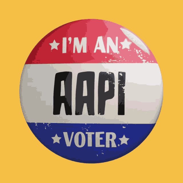 a button with red white and blue stripes on it