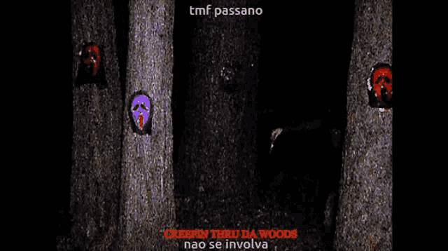 scream masks are stuck to the trunks of trees in a dark forest