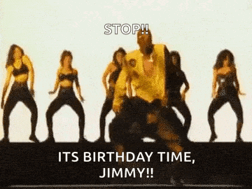 a man in a yellow shirt is surrounded by women dancing .