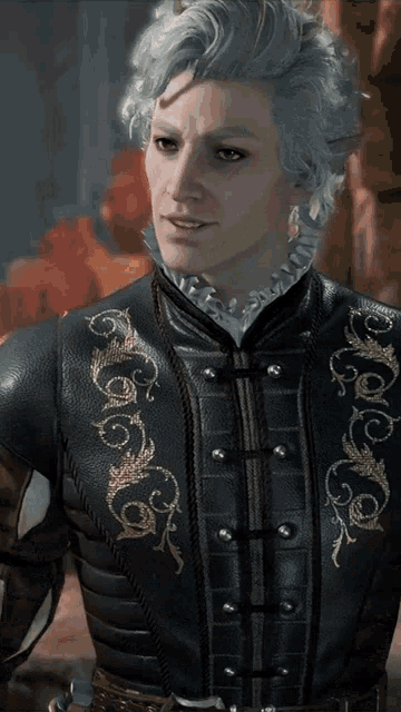 a man with gray hair and horns is wearing a black jacket with gold embroidery