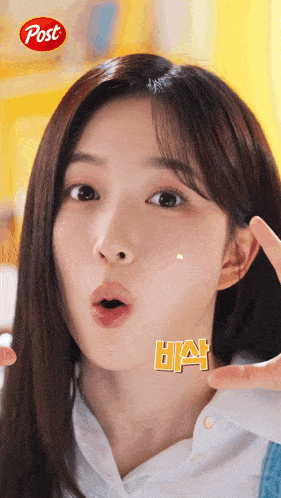 a girl with a post logo on her face