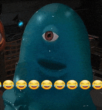 a blue monster with a single eye is surrounded by laughing emoticons .
