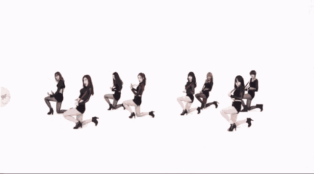 a group of young women are dancing in a row on a white background .