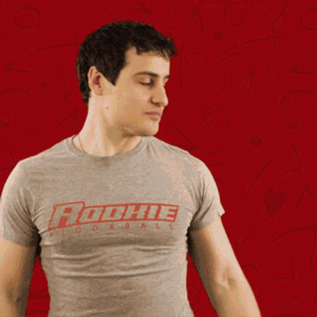a man wearing sunglasses and a chain around his neck is wearing a t-shirt that says ' aoh '