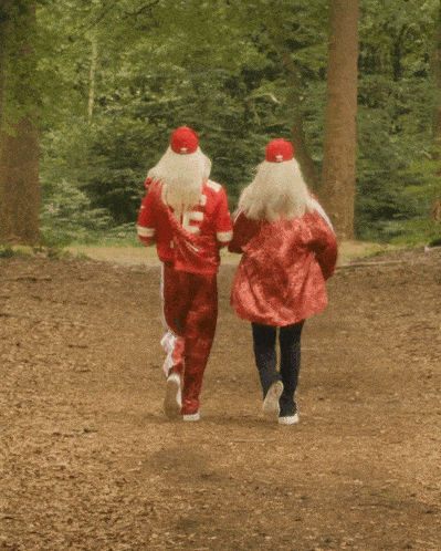 a man and a woman wearing red shirts with the number 15