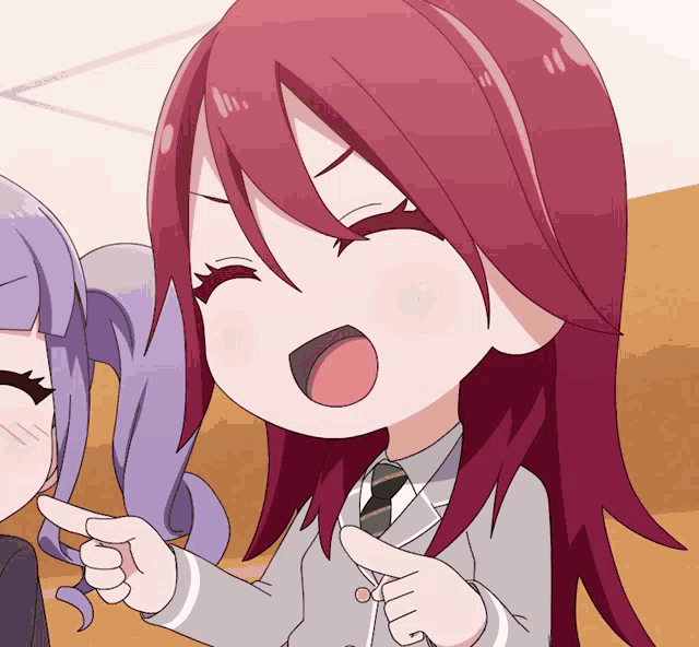 a girl with red hair is pointing at another girl with purple hair