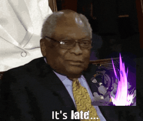 a man in a suit and tie says it 's late in front of a picture