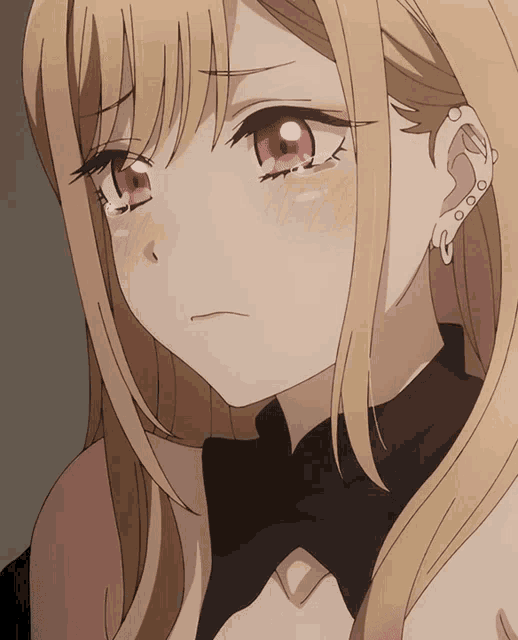 a close up of a blonde anime girl with red eyes and a piercing in her ear