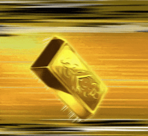 a gold bar with a lion on it is being thrown in the air