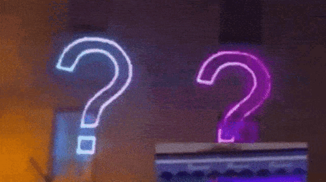 a neon sign with the letter n and a question mark on it