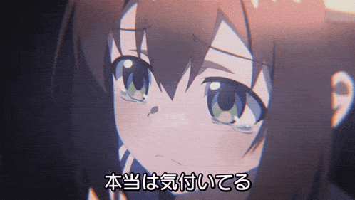 a close up of a girl 's face with japanese writing on the bottom