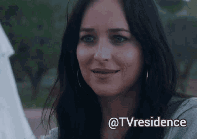 a close up of a woman 's face with the words @tvresidence below it
