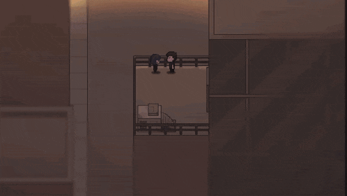 a man and a woman looking out over a city