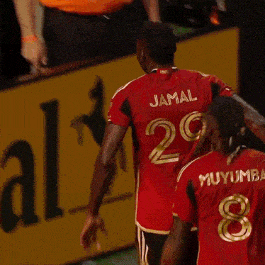 a soccer player wearing a jersey with the number 22 on it