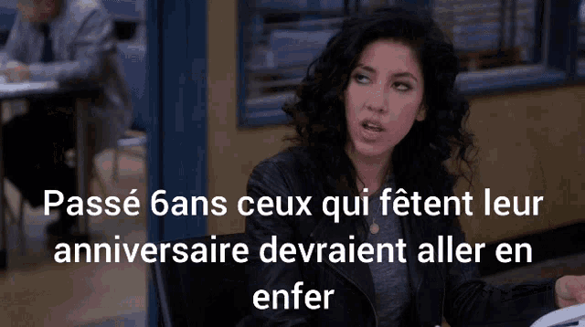 a woman sitting at a table with the words passe 6ans ceux qui fetent leur anniversaire devraient aller en enfer
